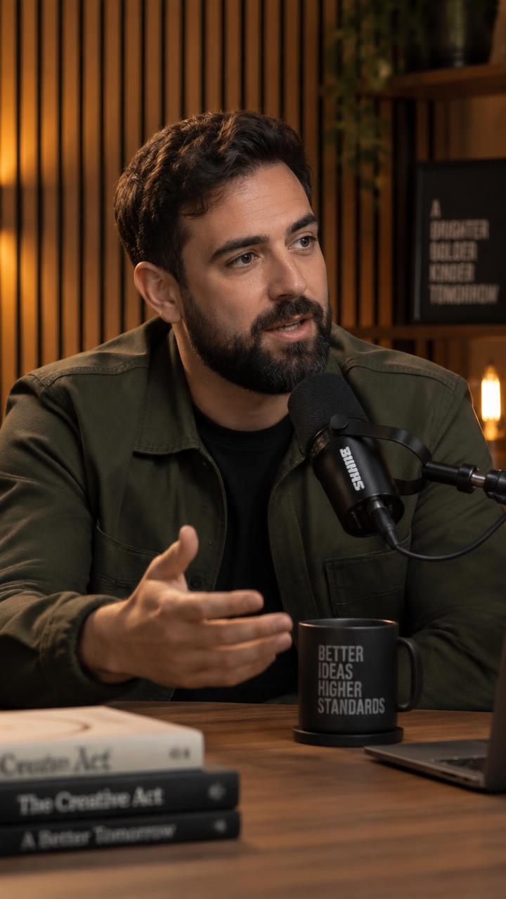 Vertical clip preview of a podcast host speaking into a microphone